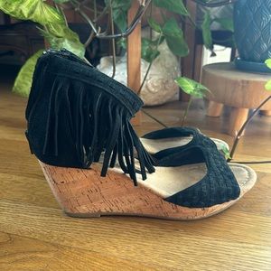 Minnetonka black and tan fringe wedge sandals